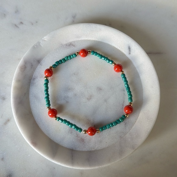 Elegant Beaded Bracelet with Orange and Green Accents - Picture 1 of 4